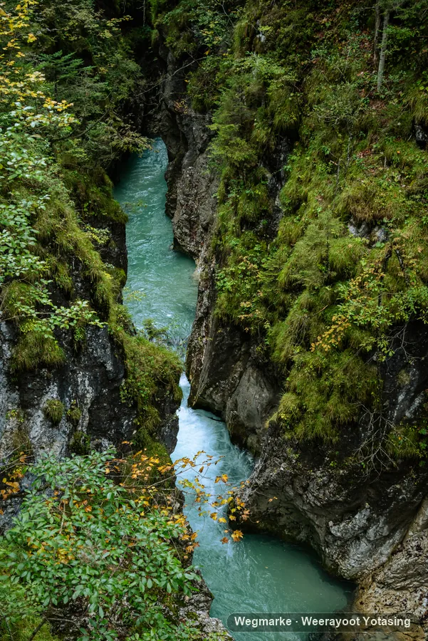 Blue water running through a mountain gorge